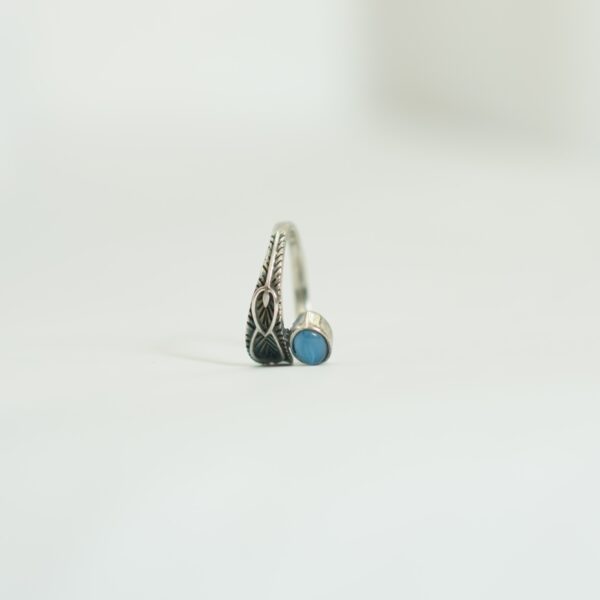 Handcrafted Adjustable Silver Ring with Blue Stone – Leaf Motif Design