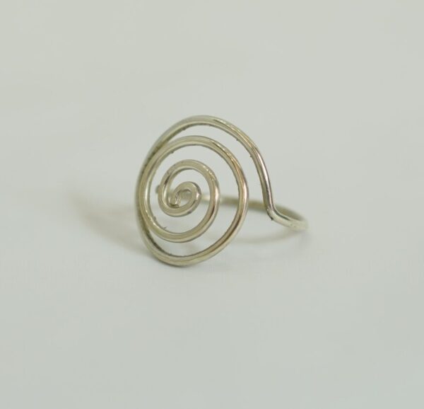 Elegant handmade silver ring featuring a bold spiral motif. A perfect blend of tribal spirit and modern minimalism. Crafted in Morocco.