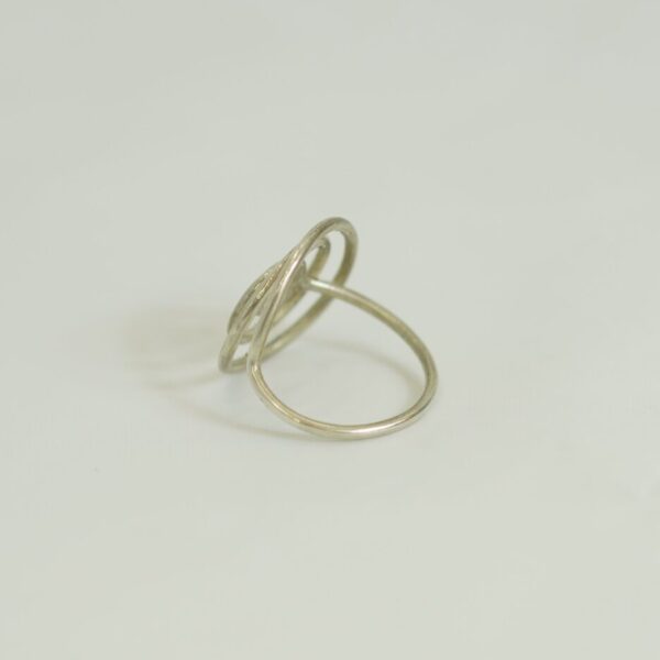 Elegant handmade silver ring featuring a bold spiral motif. A perfect blend of tribal spirit and modern minimalism. Crafted in Morocco.
